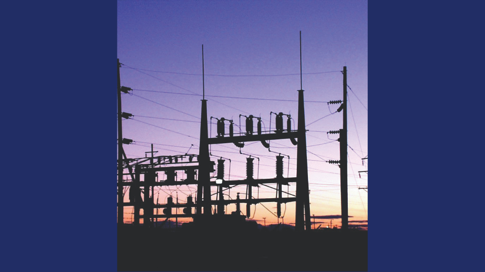 Substation with sunrise in background